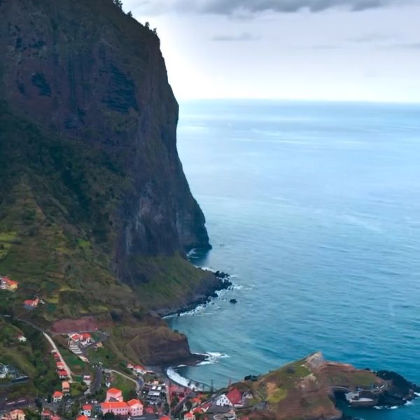 • @ilovemachico 📍Penha d’Águia, a towering rock formation between Porto da Cruz and Faial, dominates the landscape with its rugged, majestic presence. Living beneath this giant, locals embrace a quiet, traditional life surrounded by the raw beauty of nature. The steep cliffs and lush greenery create a breathtaking backdrop for the small villages nestled at its base, where daily life unfolds in the shadow of this awe-inspiring natural monument.

#travelportugal #visitmadeira #islandparadise #traveladdict #madeiraisland #portugal #travelgram #portugallovers #madeiratravel #exploreportugal #breathtakingviews #madeira #travelbucketlist #islandlife #discovermadeira #adventuretime #holidaydestination #visitportugal #naturelovers #igmadeira #travelinspiration #hikingadventures #instatravel #portugalviews #madeirawow #beautifuldestinations #amazingplaces #webdesign #navegabemwebdesign #website